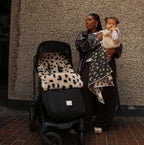 Fußsack Puffmuff® - Merino-Lammfell - Noir + Leopard - BINIBAMBA