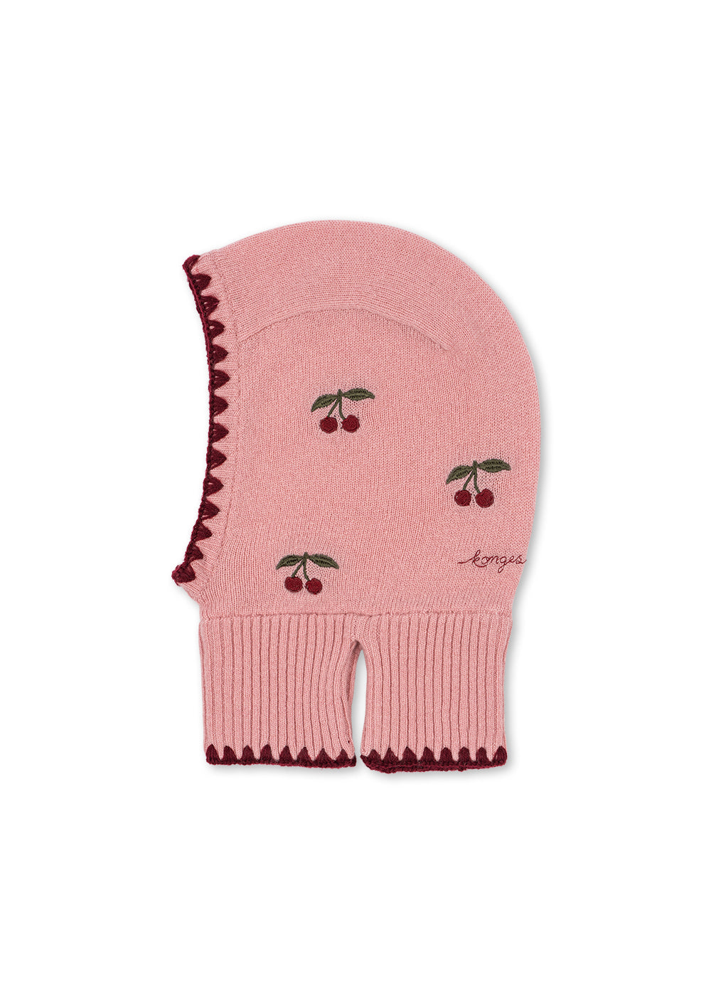 Woll-Balaclava Collette – Pale Blush – Konges Sløjd: rosa Strick-Balaclava mit Kirschen und dunklem Saum, von der Seite.